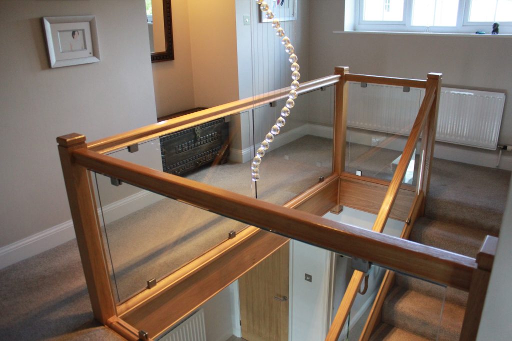 An oak & glass staircase renovation in Macclesfield