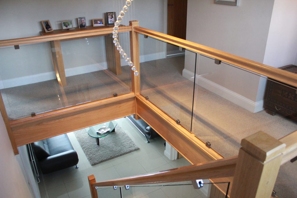 An oak & glass staircase renovation in Macclesfield