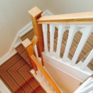Painted spindles with oak rails